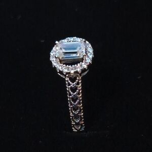 Elegant Silver and Moissanite Ring
